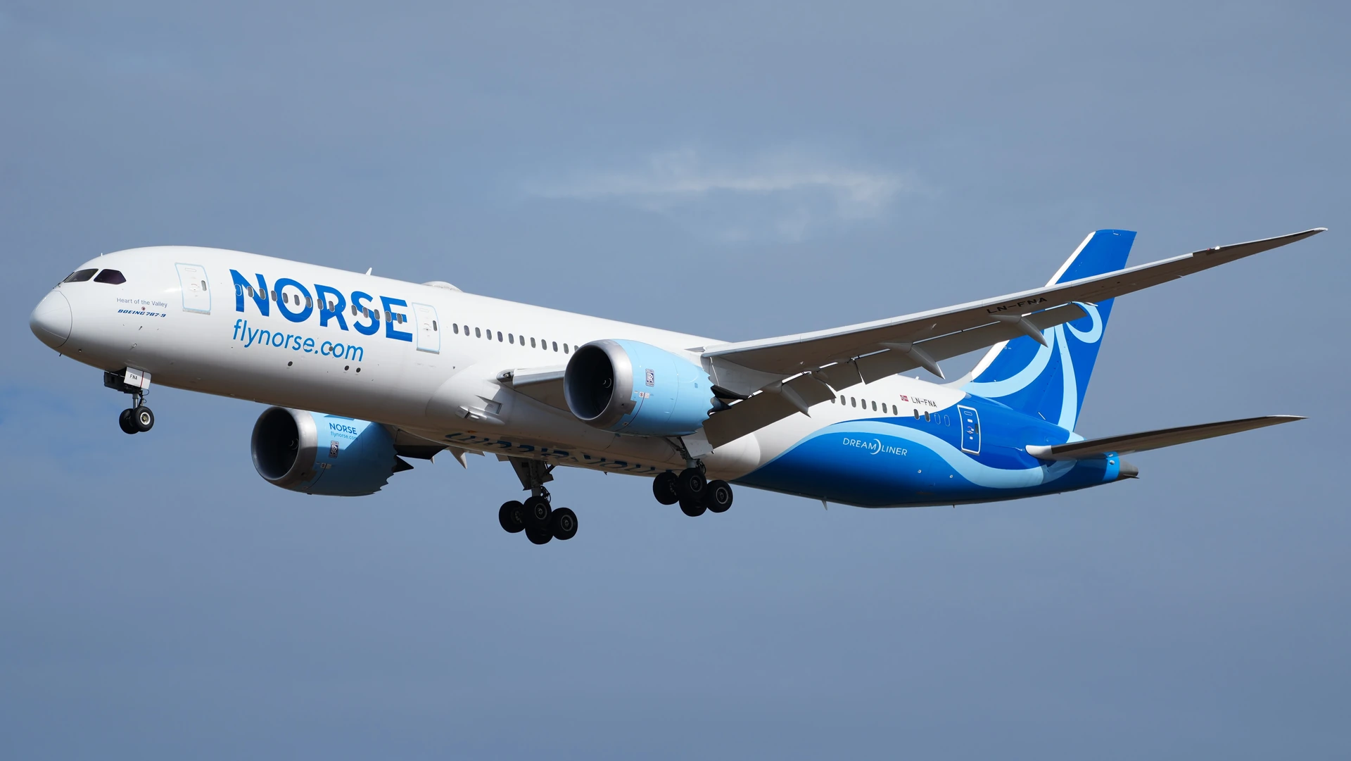 Archive photograph of Norse Atlantic Boeing 787-9 LN-FNA approaching Berlin Brandenburg with landing gear extended.